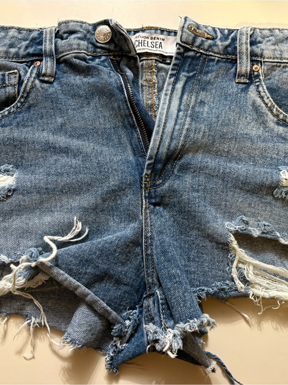 refuge Chelsea High-Rise Distressed Denim Shorts in Blue